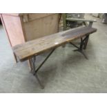 An early 20th century pine topped bench