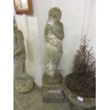 A composite stone garden statue of classical lady on plinth