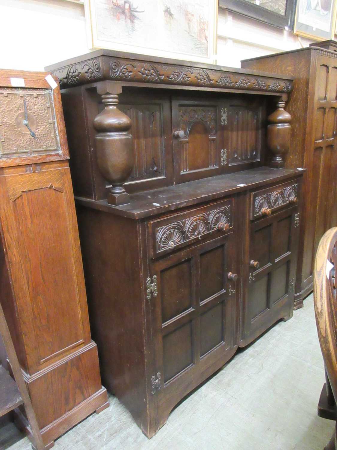 A mid-20th century oak court cupboard