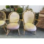 An Ercol rocking chair along with an Ercol open armchairMinor marks and stains throughout. Some