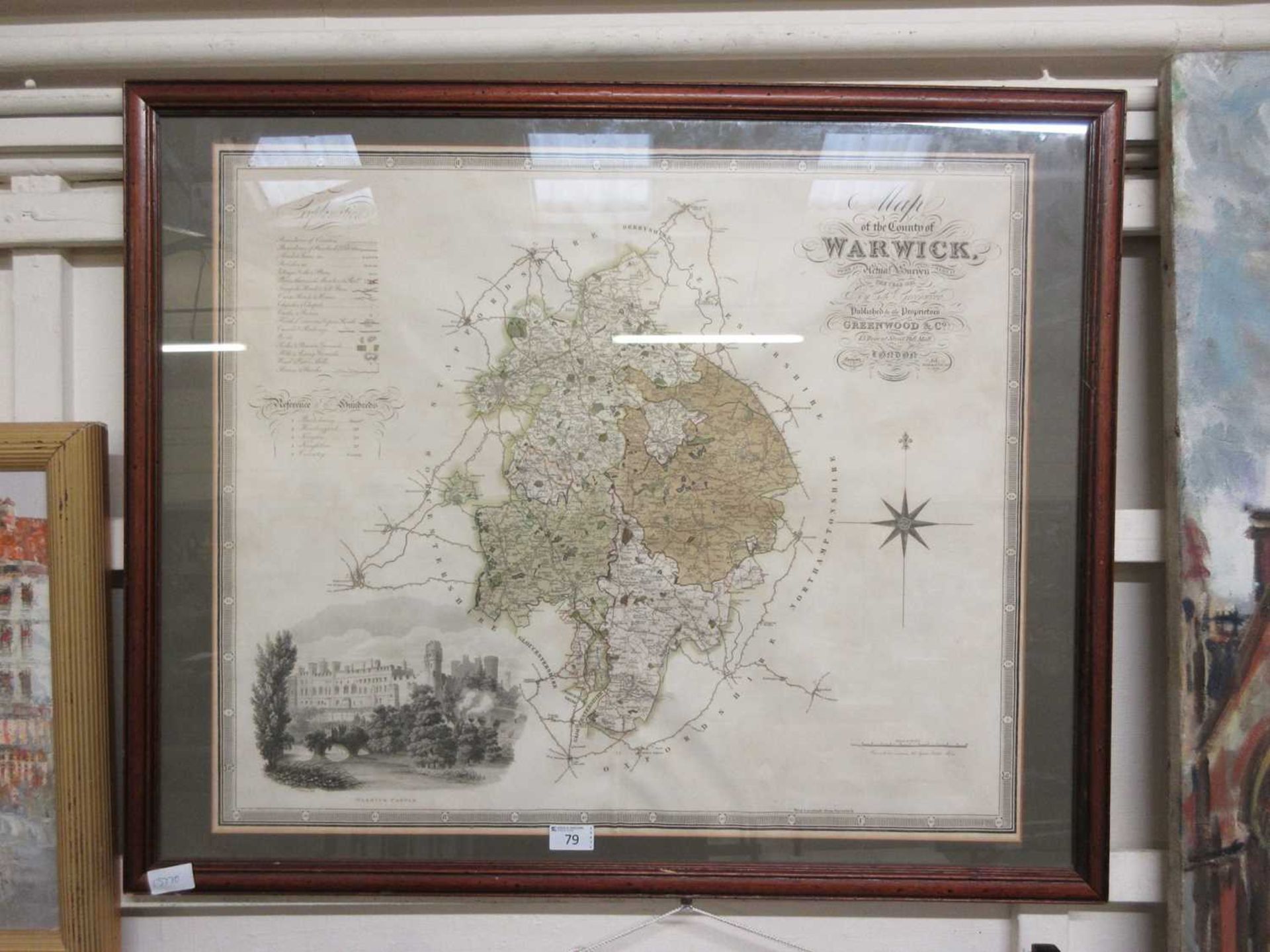 A framed and glazed map of the county of Warwickshire