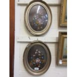 A pair of 19th century gilt framed oval oil paintings of still life