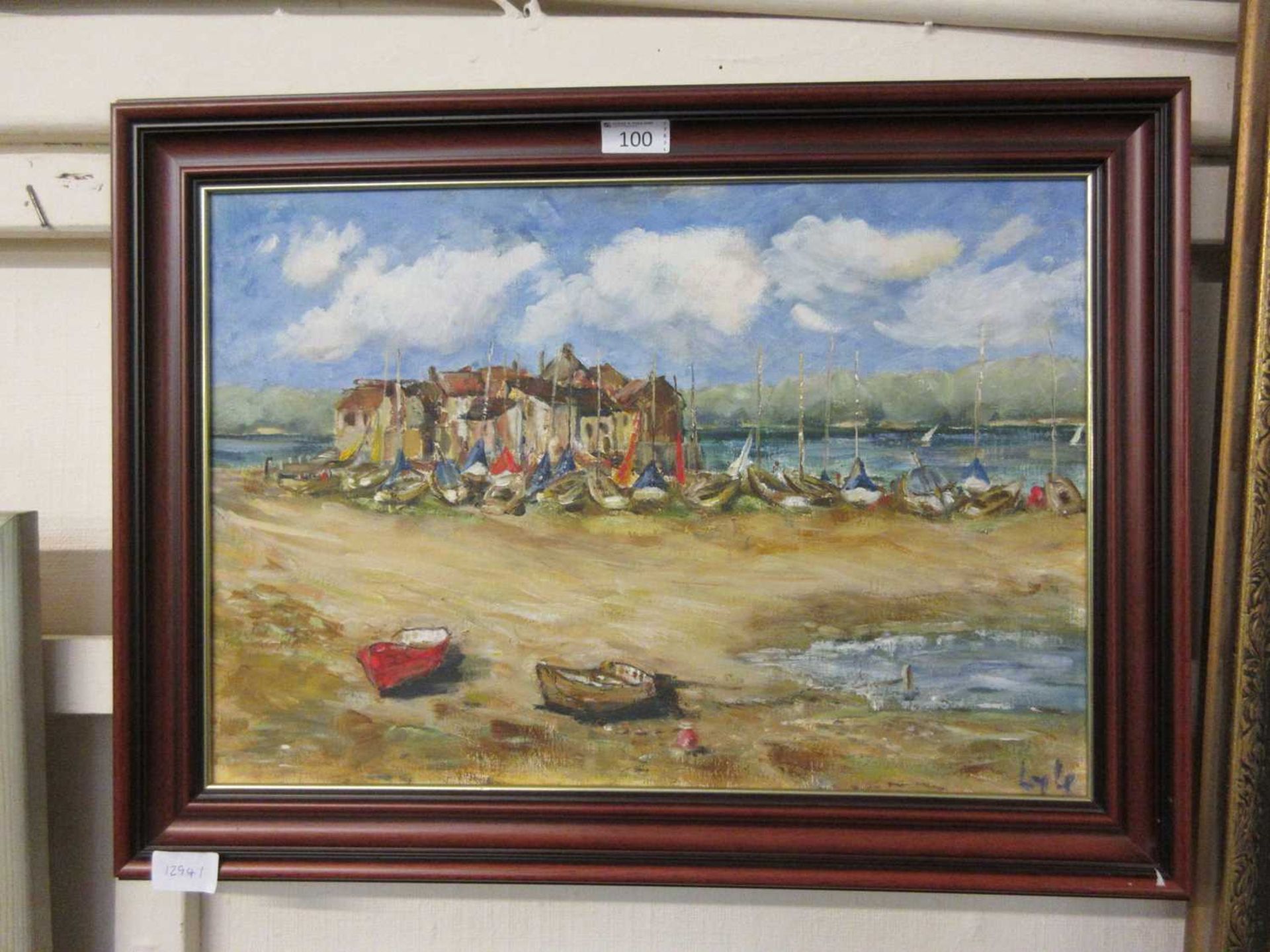 A modern framed oil on board of coastal scene signed Lyle