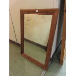 A modern pine framed mirror