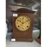 An Edwardian mahogany mantle clock