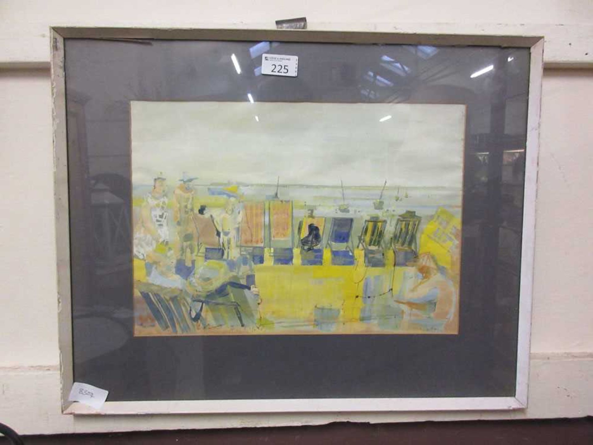 A framed and glazed watercolour of beach scene signed bottom right