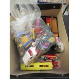 A box containing die cast toys to include lorries, trucks, etc