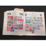 A stamp album containing a quantity of stamps from around the world