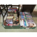 Two trays containing a quantity of DVDs relating to railways