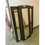 Two walnut framed bevel glass mirrors