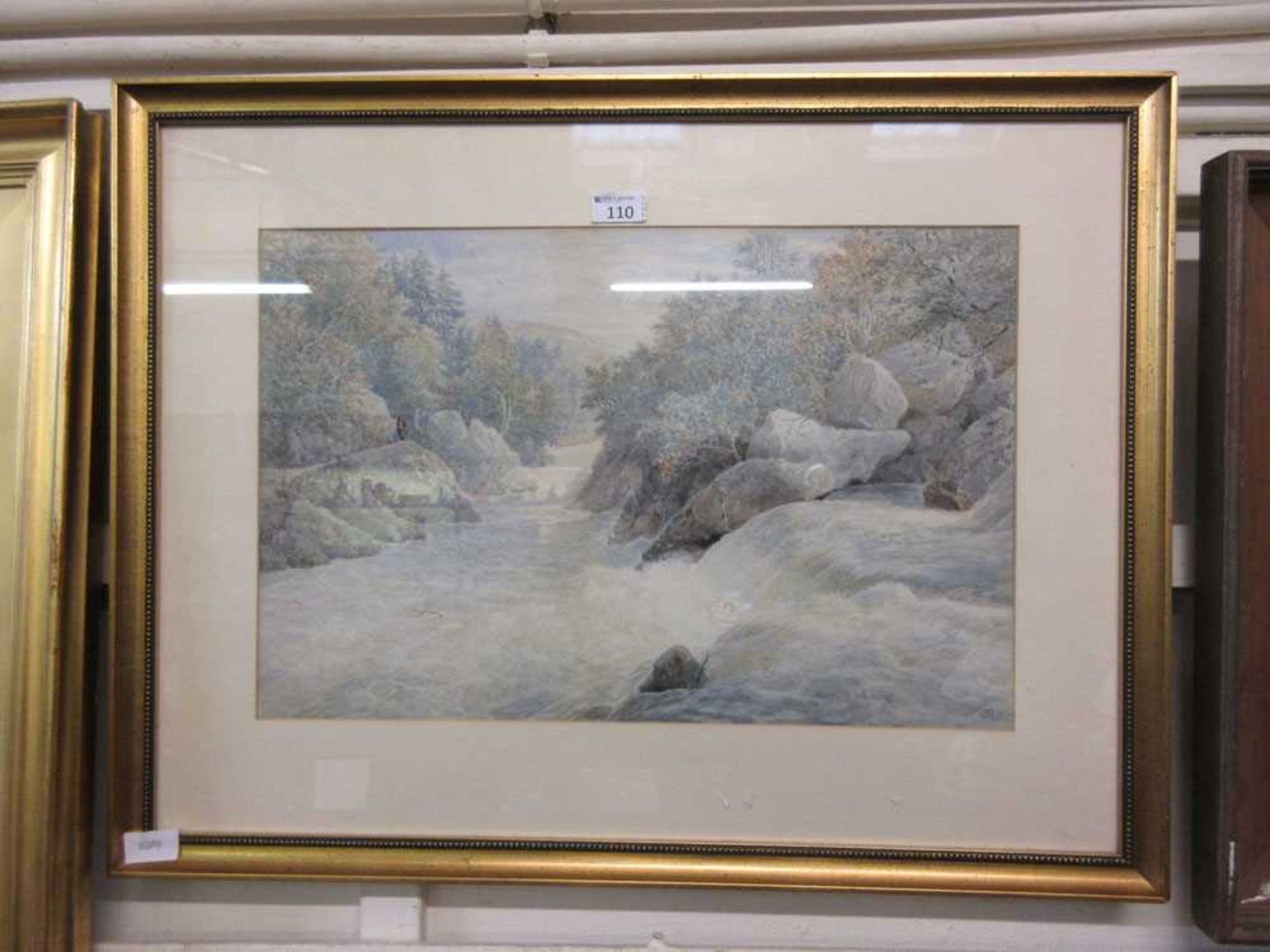 A framed and glazed watercolour of figure by river scene signed Adams