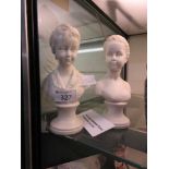 Two moulded busts of Parisian boy and girl