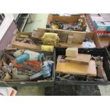 A selection of four trays of various spanners, electrical items, motors, etc