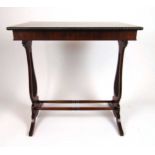 An early 19th century mahogany occasional table, the flame mahogany and rosewood banded top on