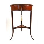 An Edwardian mahogany, satinwood banded, marquetry and parquetry strung work table, the circular top