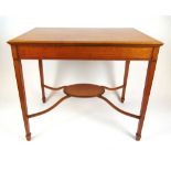 An early 20th century satinwood, ebony line inlaid and parquetry strung centre table, the
