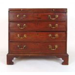 An 18th century mahogany chest of drawers, the caddy top over the brushing slide and four long