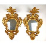 A pair of early 20th century rococo giltwood mirrors, h. 79 cm, w. 54 cmCondition commensurate
