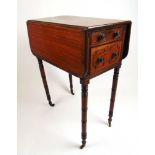 An early 19th century mahogany, rosewood banded and ebony moulded work table, the drop leaf top over