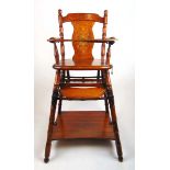 An early 20th century beech metamorphic childs high chair/walking aid, the transfer decorated back