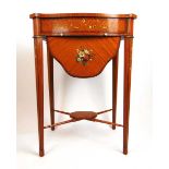 An early 20th century satinwood, rosewood banded and artistically painted work table, the serpentine