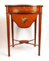 An early 20th century satinwood, rosewood banded and artistically painted work table, the serpentine
