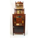 An Edwardian rosewood, marquetry and boxwood strung music cabinet, the superstructure with beveled