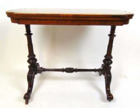 A late 19th century burr walnut, marquetry and boxwood strung card table, the shaped fold over top