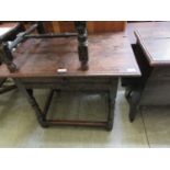 An early 18th century oak childs table, teh moulded top over single drawer on turned legs, h. 66 cm,