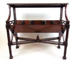 A reproduction mahogany Chippendale style book trough, the gadrooned top over the trough with