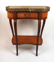 A reproduction French style mahogany and brass mounted side table, the galleried pink marble top