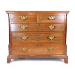 An 18th century mahogany chest of two short over three graduating drawers, the banded top over