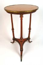 A late 18th century satinwood, purpleheart and brass mounted occasional table, the circular banded