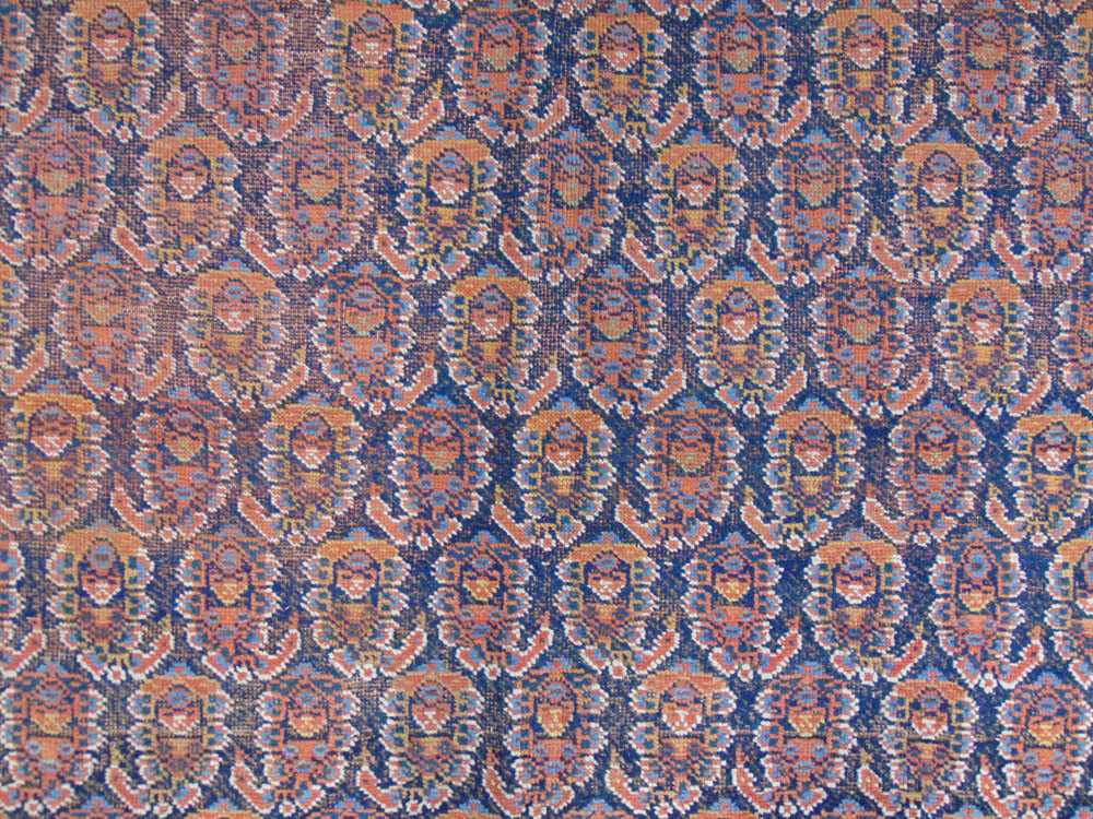 A handwoven Persian rug, possibly Kashan, the multi line border surrounding the blue ground field - Image 2 of 8