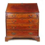 An 18th century oak bureau, the fall front with fitted interior over four long drawers on bracket