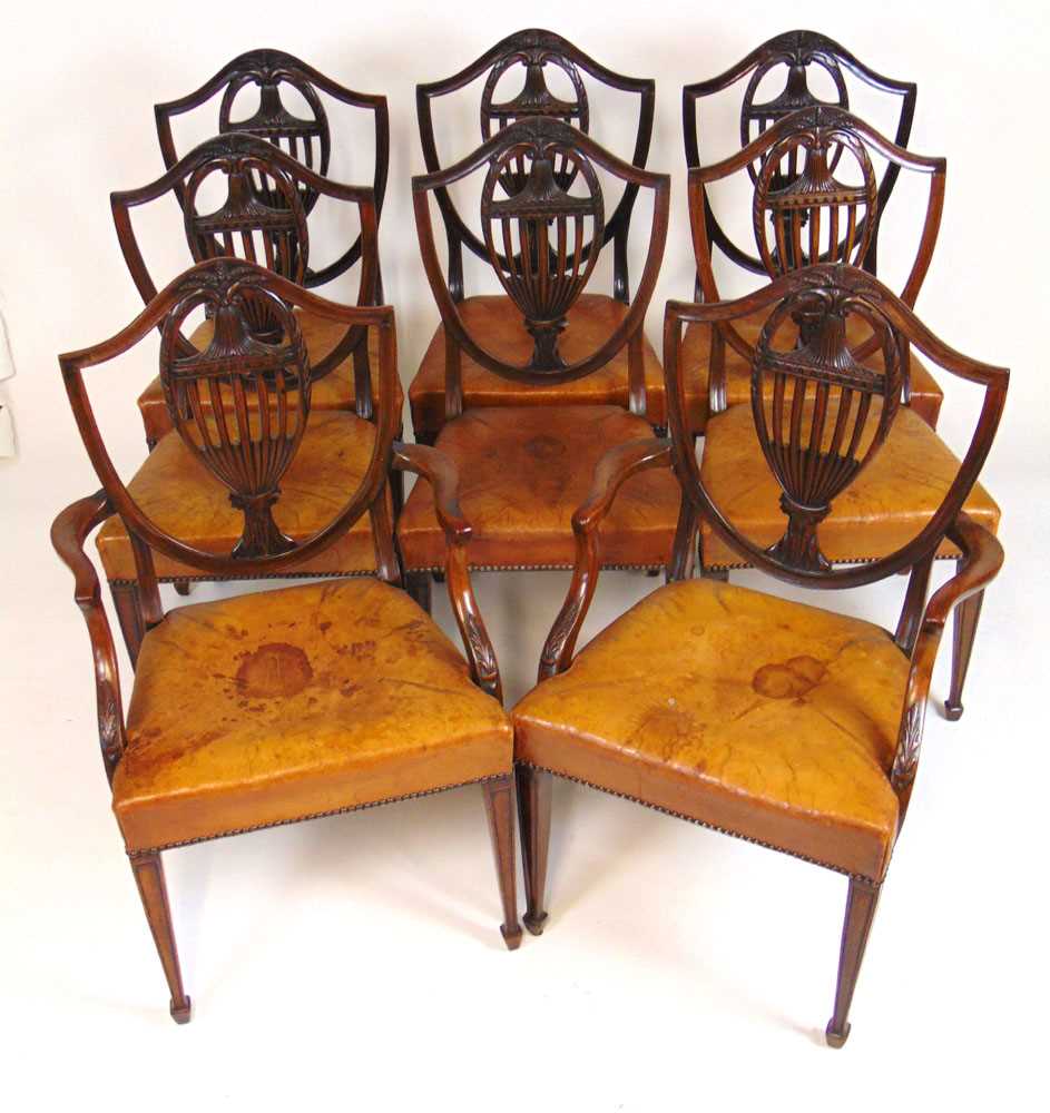 A set of eight early 20th century Hepplewhite style dining chairs upholstered in tan leather, the - Image 5 of 8