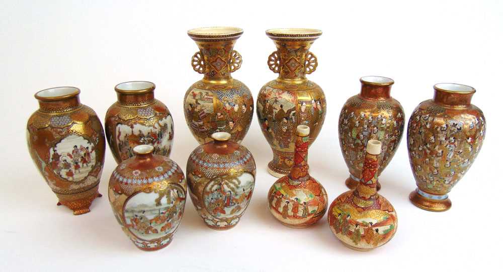 Five pairs of Meiji period Japanese Satsuma ware vases, gilt decorated with figures, largest h. 16.5