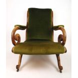 A Regency simulated rosewood library chair upholstered in a cut green fabric, the over swept back