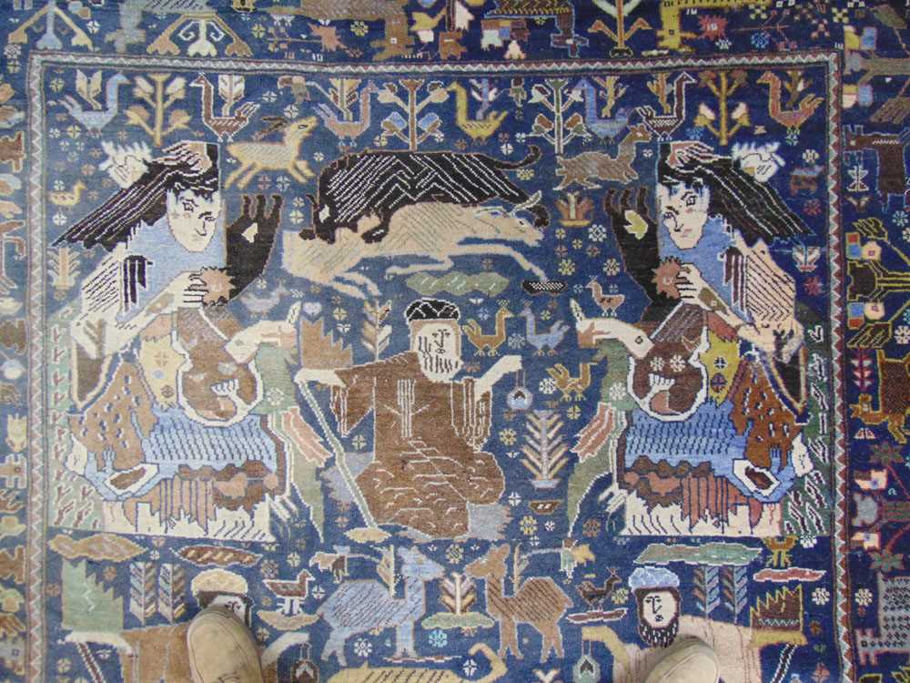 A handwoven Caucasian rug, the main border with animal motifs, surrounding the blue ground field - Image 3 of 5