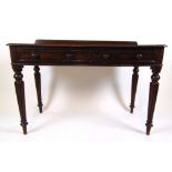 A 19th century mahogany two drawer side table , the top on four turned and fluted legs, h. 78 cm, w.