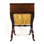 A 19th century mahogany worktable, the top lifting to reveal a vacant interior over a single