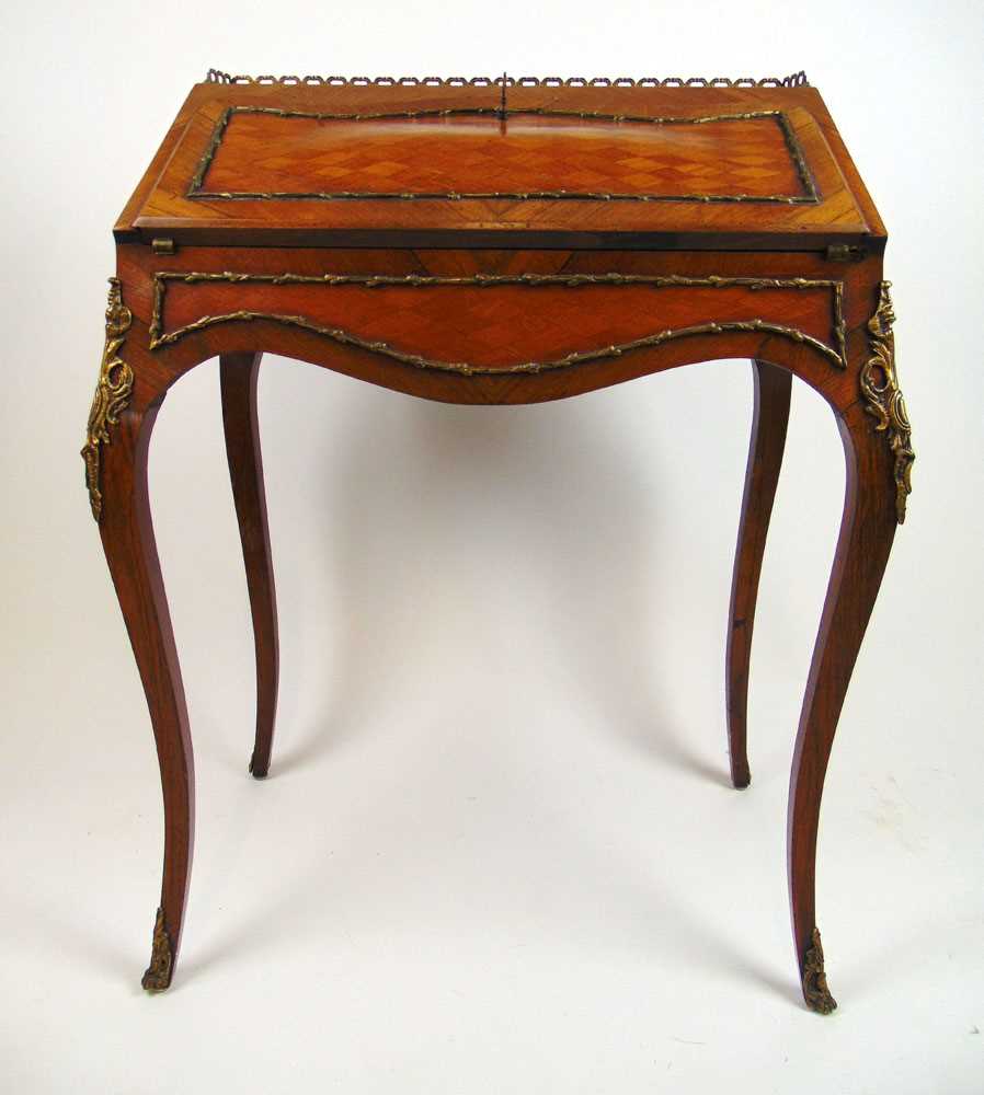 A 19th century French kingwood, rosewood, boxwood strung and brass mounted ladies writing desk (