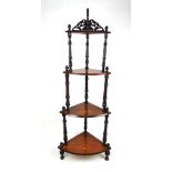 An Edwardian walnut, boxwood strung and marquetry corner what-not, the four graduated shelves