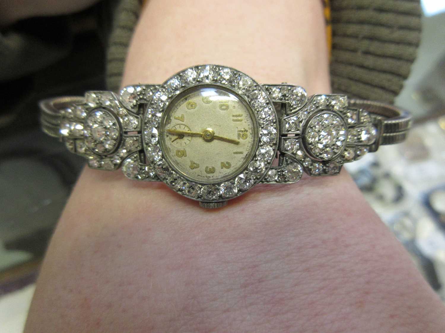 A mid 20th century lady's white metal and diamond set cocktail watch. Total diamond weight estimated - Image 4 of 4