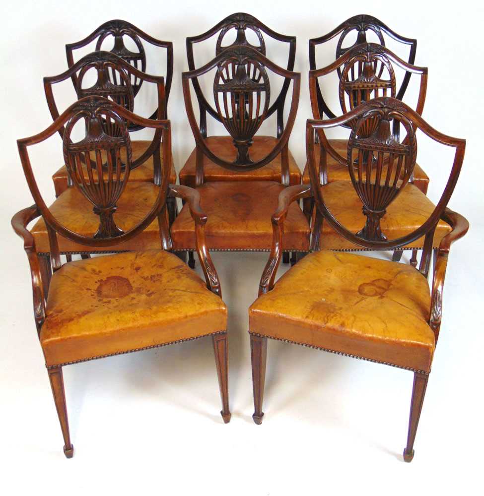 A set of eight early 20th century Hepplewhite style dining chairs upholstered in tan leather, the - Image 7 of 8