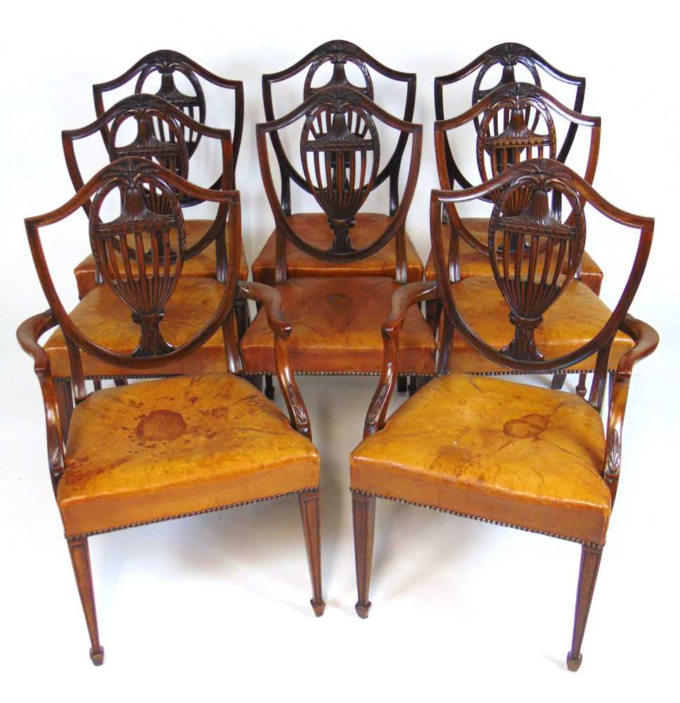 A set of eight early 20th century Hepplewhite style dining chairs upholstered in tan leather, the - Image 3 of 8