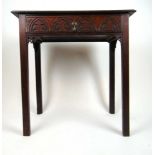 A 19th century oak single drawer side table, the moulded top over the carved drawer on chamfered