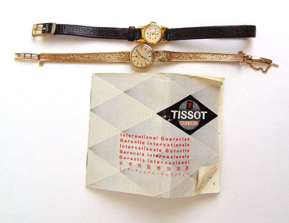 A lady's Tissot 9ct gold wristwatch together with a lady's yellow metal MuDu wristwatch marked '