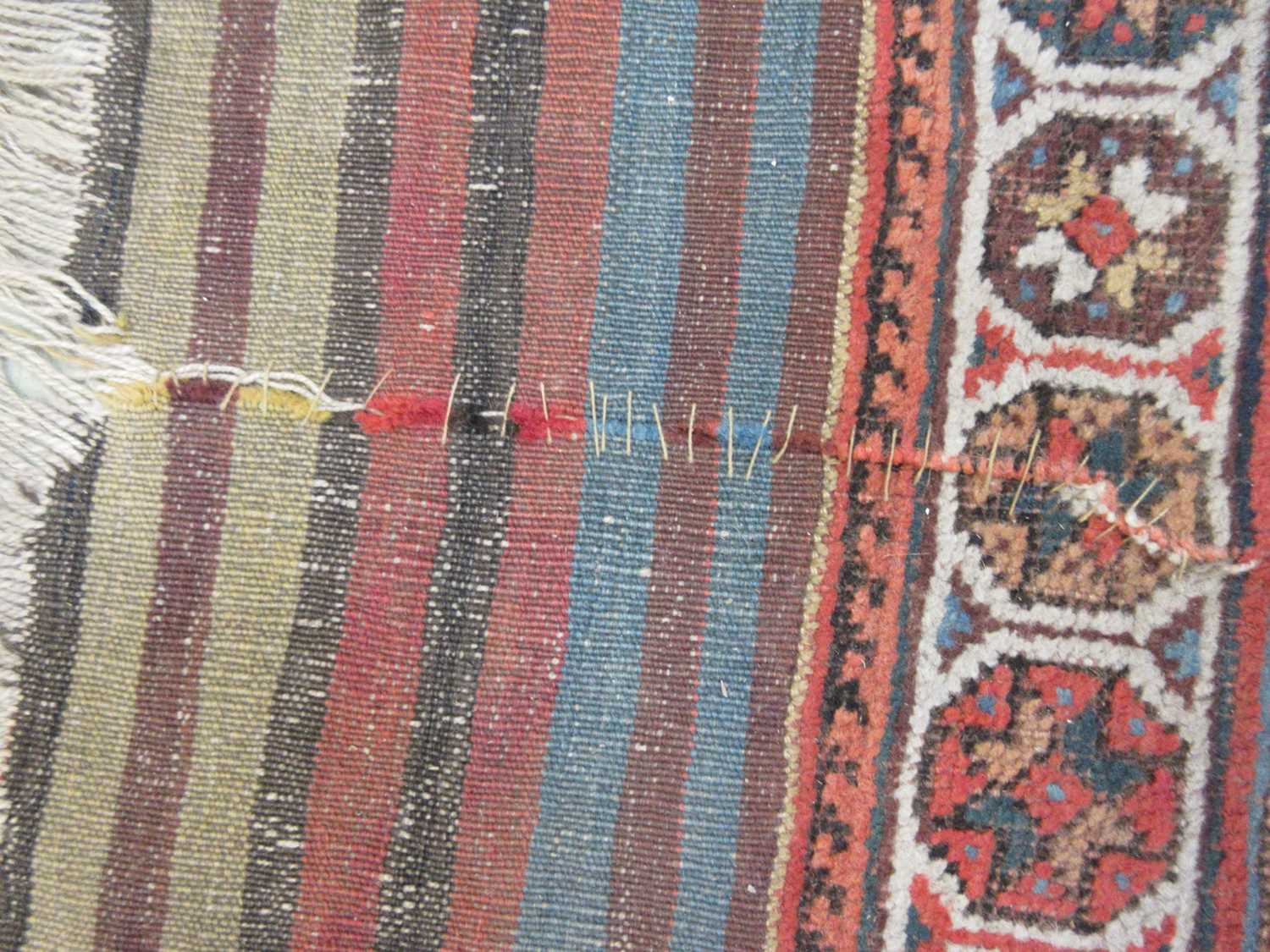 A handwoven Persian rug, possibly Kashan, the multi line border surrounding the blue ground field - Image 3 of 8