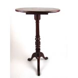 A 19th century elm and oak candle stand, the oval top on turned column and three legs, h. 90 cm,